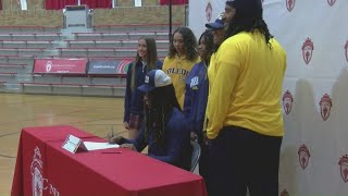 Student-athletes show off school colors at signing day at high schools across the area