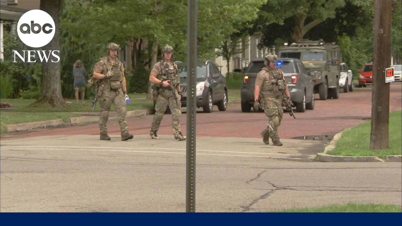 Murder suspect Michael Burham remains at large