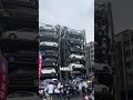 Transport Vehicles From Elevated Garages Using Robotic Systems