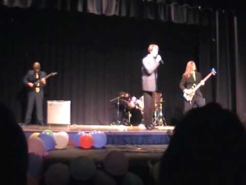 My band playing Toxicity at our school's variety night, where we won top prize for group performance. The band members are; Vocals - Matt Higgs Drums - Tim Hollier Guitar - Cameron Hosking Piano - Brendan Hosking Bass - Myself (Ian Buchanan) Though we were introduced as 'False Icons' we have since discovered that the name has already been taken.