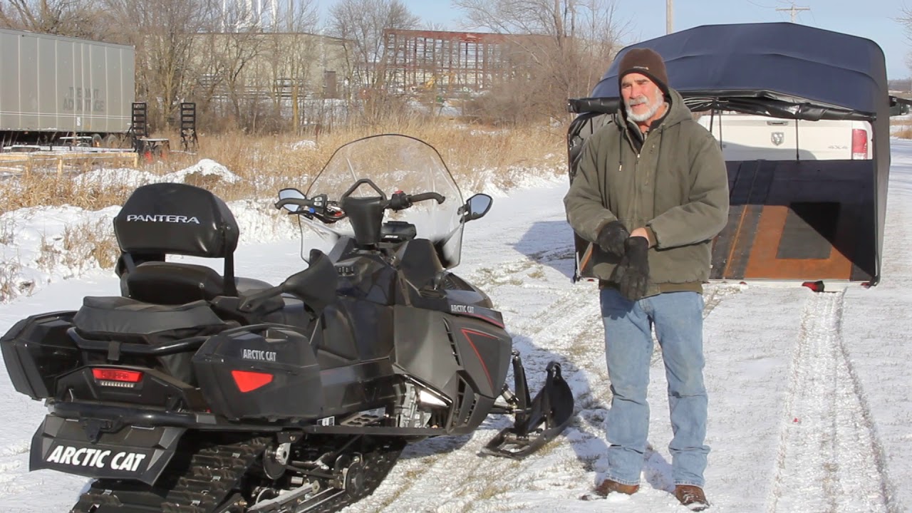 Loading a snowmobile into a 1065 Sport Series SnoCap