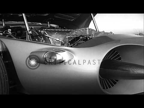 Workers in General Motors Research Labs assemble 1956 Firebird II Gas Turbine Con...HD Stock Footage