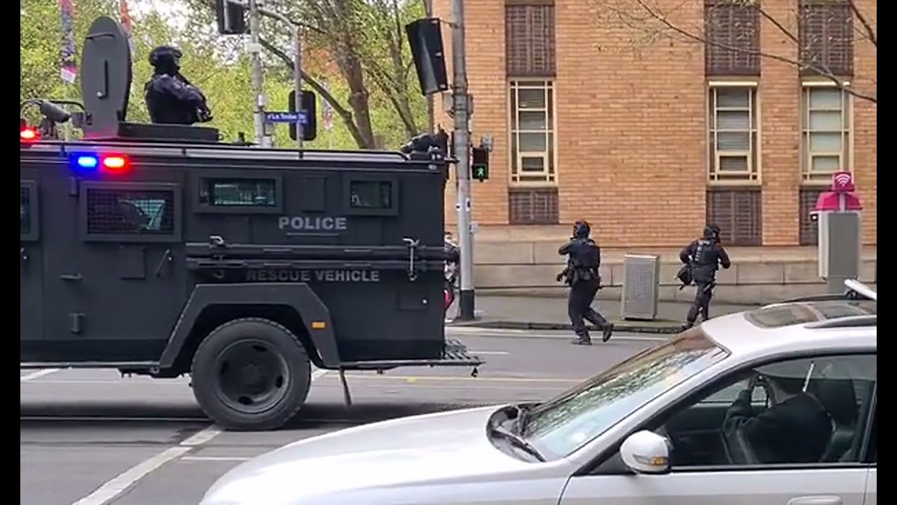 Police fire rubber bullets anti at vax protest from a Military Bearcat G3