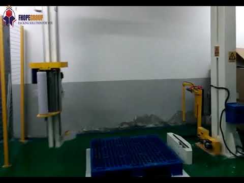 Rotary arm pallet packing machine