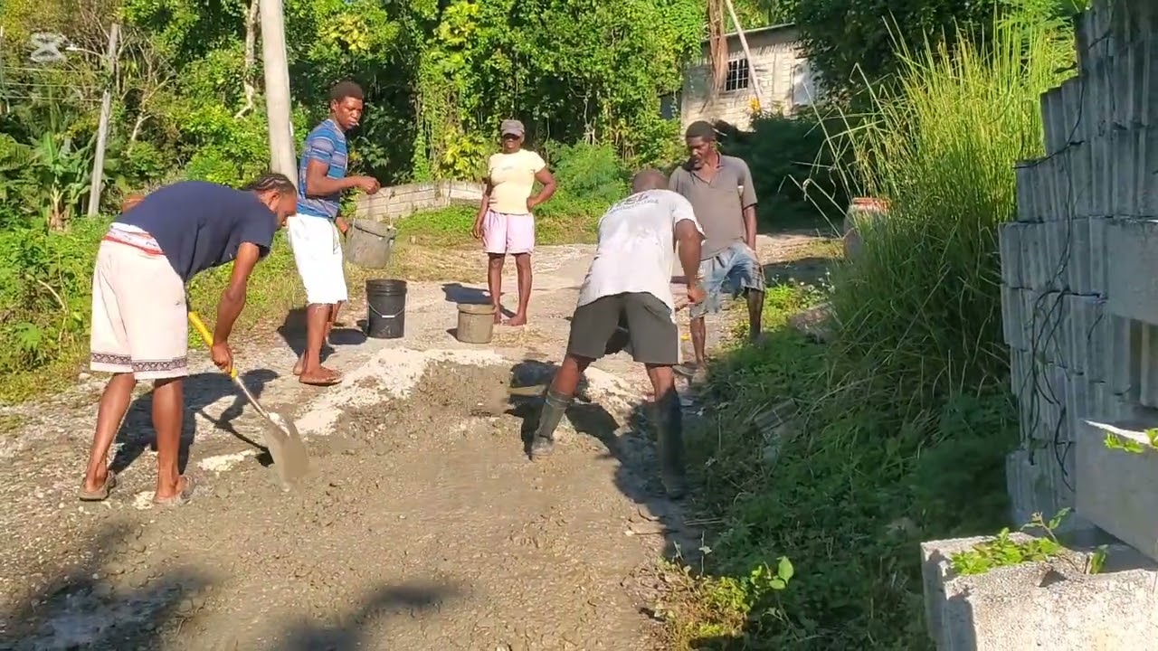 Residents and members of Mount Nebo church fixing the road