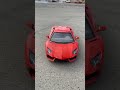 Trophy Truck jumps over two Lambos