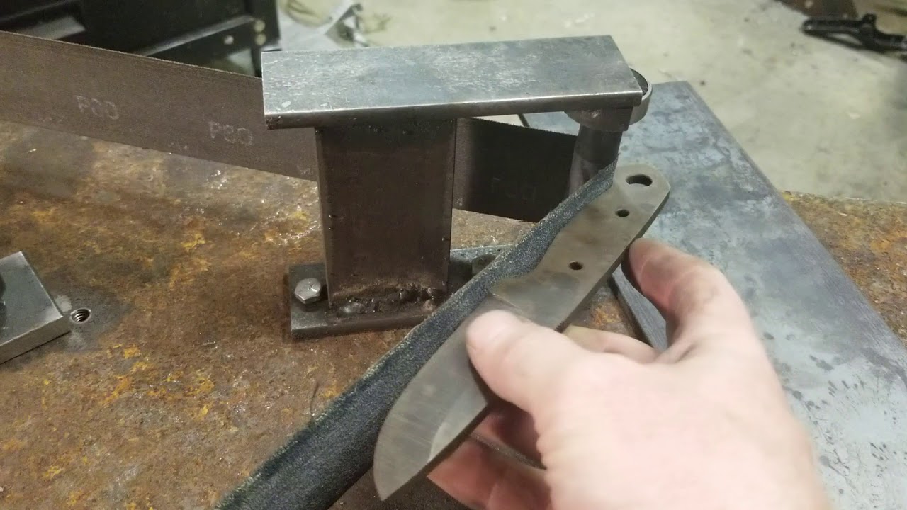 Horizontal 2x72 belt grinder.