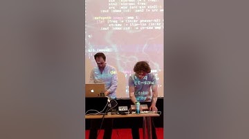 Sam Aaron and Jonathan Graham performing music by coding