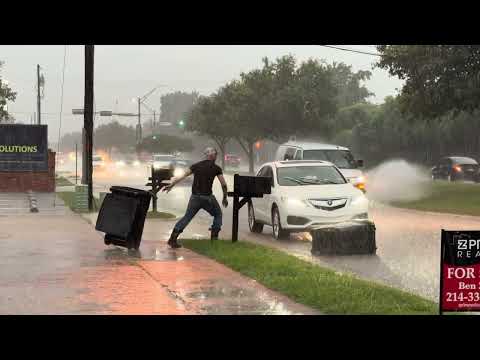Good Samaritan Clears Bins from Road After Severe Storm