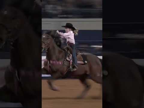 Barrel racer at 7 years old competes with the pros.