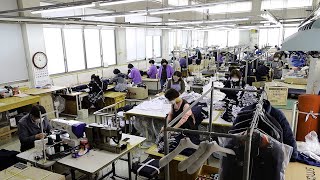 Process of mass production of Casual School Uniform made by machines and humans together In Korea.