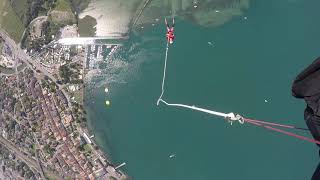 Bungee Jumping From A Paraglider In Switzerland At The Acroshow And Base Jump Finish