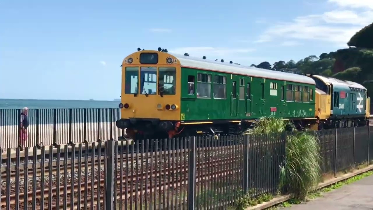 Trains on Dawlish sea wall Summer 2023