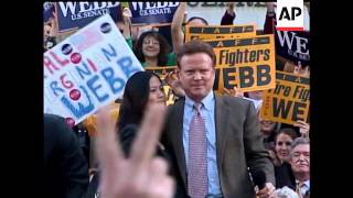 Virginia Senator Jim Webb defends a senior aide who was arrested after trying to carry a loaded pist