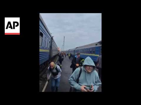 Moment a Russian drone strikes a train by the Ukraine-Poland border