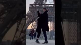 Abigail Cowen and Danny Griffin kissing in Paris