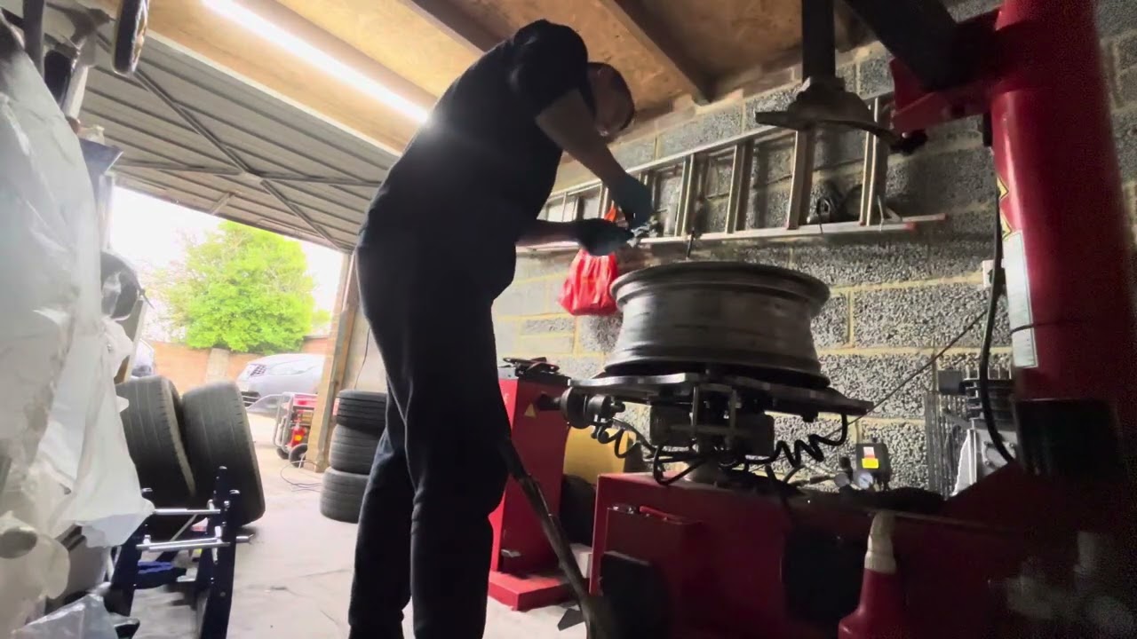 POV of tyre change…. Close up.. 