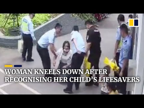 Chinese woman kneels down after recognising men who saved her child’s life