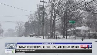 Snowy conditions on Pisgah Church Road in Greensboro