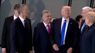 Trump shoves aside NATO leader