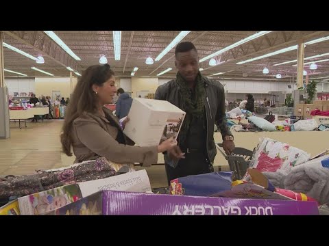 New in Town: Jason Mikell and Laura Caso shop for deals at Krazy Bins in Parma