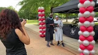 Presenting Diplomas to CMS Seniors