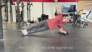 Side plank with  DB pass through