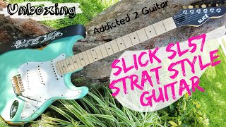 SLICK SL57 STRAT STYLE GUITAR UNBOXING-BEST GUITAR UNDER $300 MIGHT BE!!!!!