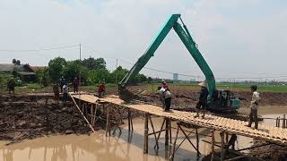 Normalization Hazarded By A Bamboo Bridge The Amphibian Excavator Could Not Move It Was Finall