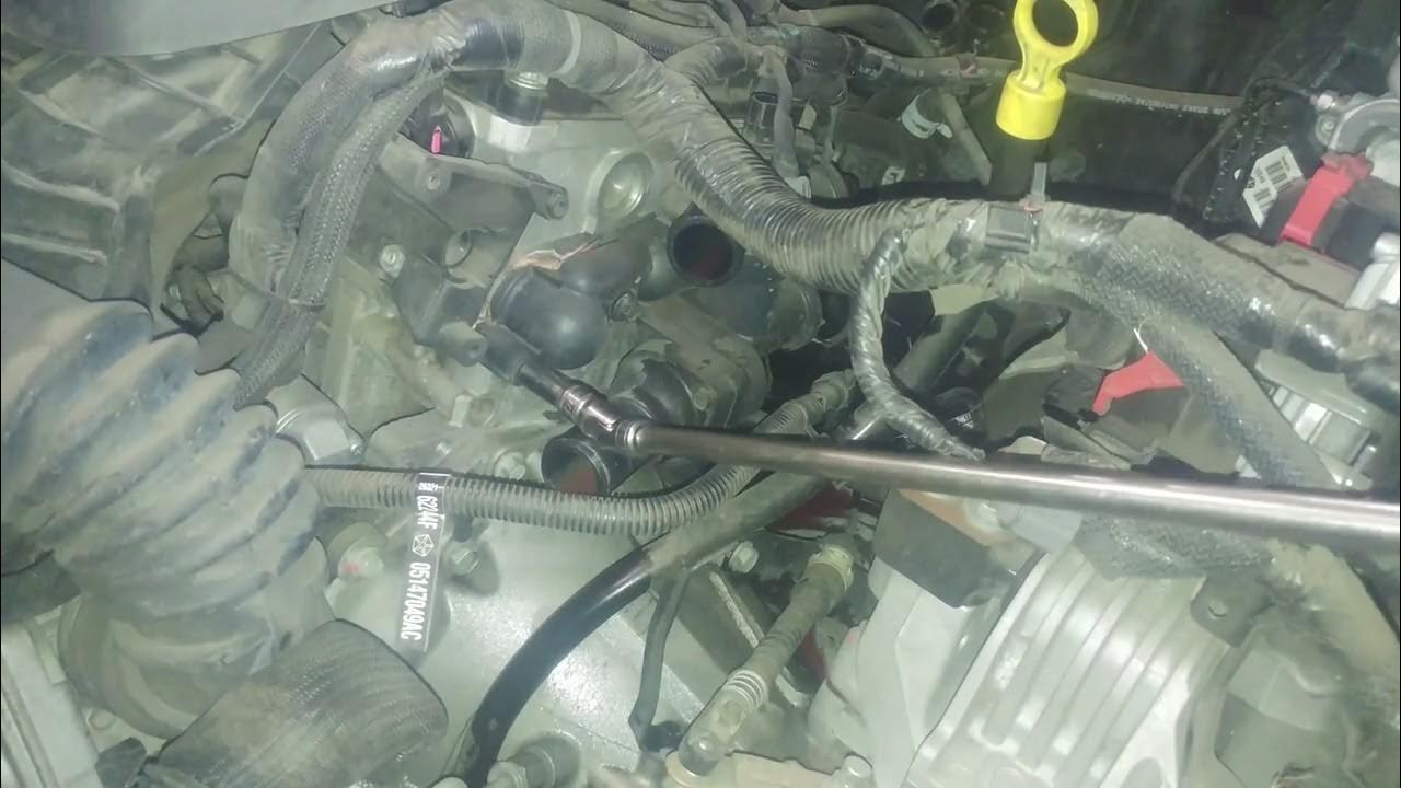 Thermostat housing assembly replacement 2013 Dodge Journey 2.4L. Two