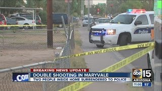 Two people detained after double shooting