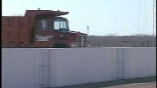 Read, then watch clip Truck vs. Concrete Safety Barrier
