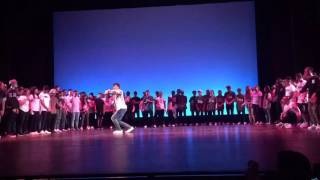 11 y/o girl in a hip hop freestyle circle.  Watch for the crowd to explode when she comes on stage