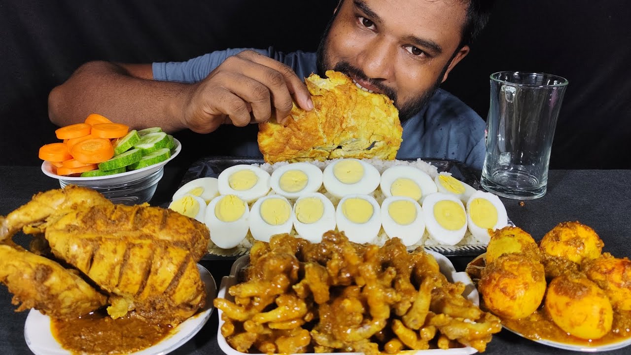 Spicy full chicken curry , chicken feet curry, egg curry, egg fry with rice eating show
