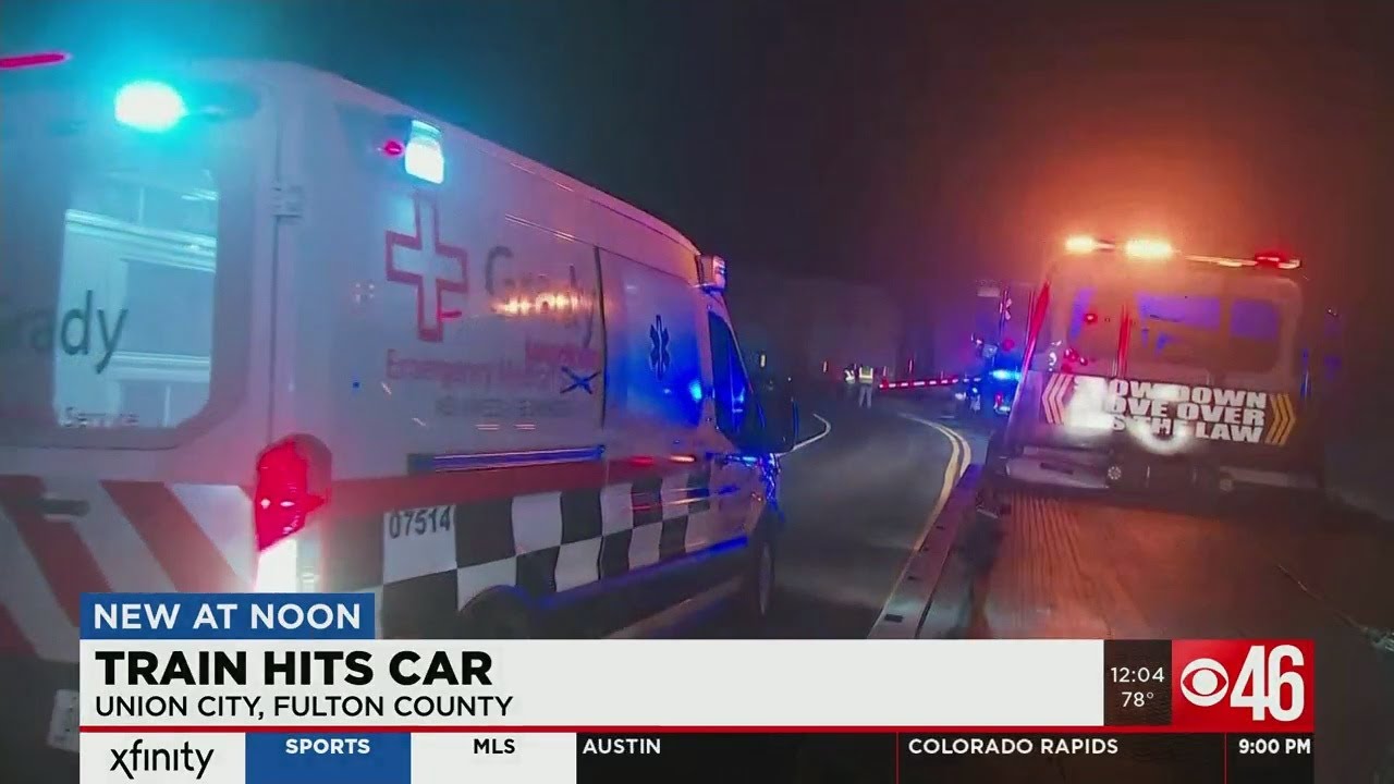 Driver arrested on suspicion of DUI after car collides with moving train