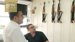 ISIL violence forces Iraqi villagers to buy weapons