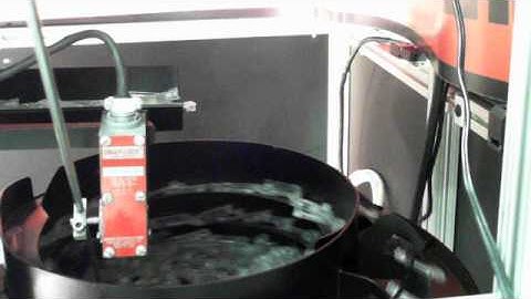 Laser marking medical device Worldwide Laser with vibratory bowl system and UV laser