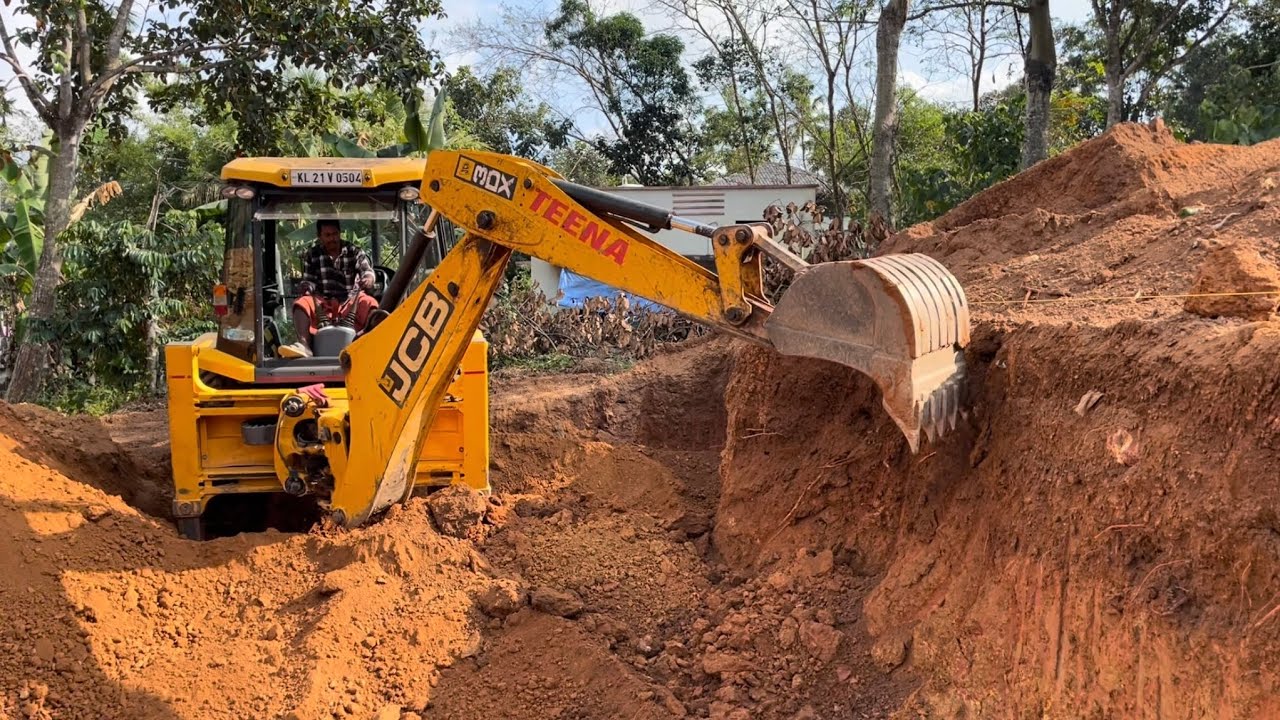Jcb 3dx cutting and moving soil to make huge soil heap 