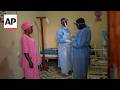 Women are on the front lines in Congo's Ebola fight often without protective gear