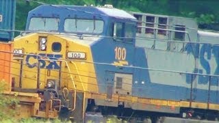 CSX 100 Pulling Intermodal Train on Elevated Tracks