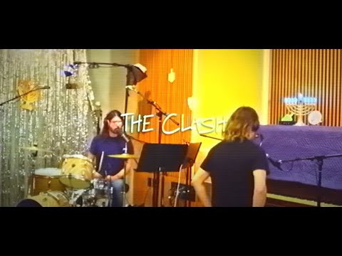 Dave Grohl and Greg Kurstin covered The Clash‘s “Train In Vain” now posted