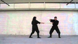 Stick fighting with Kim Kunoichi (#5 basic block)