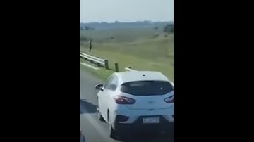 from FB: hwy barrier removed to escape bumper to bumper traffic jam