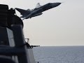 Russian jets fly low over us navy ship