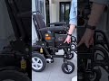 Modern Electric Wheelchair Demonstration Outside Building