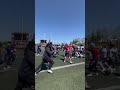 Equipment crew member kicks a field goal to end practice 🎯
