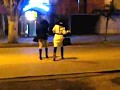 Two Drunk Girls in Boots Stumbling Home After a Nightout