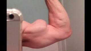 Big Biceps seem to grow while flexing flex slow motion Victor Costa Vicsnatural