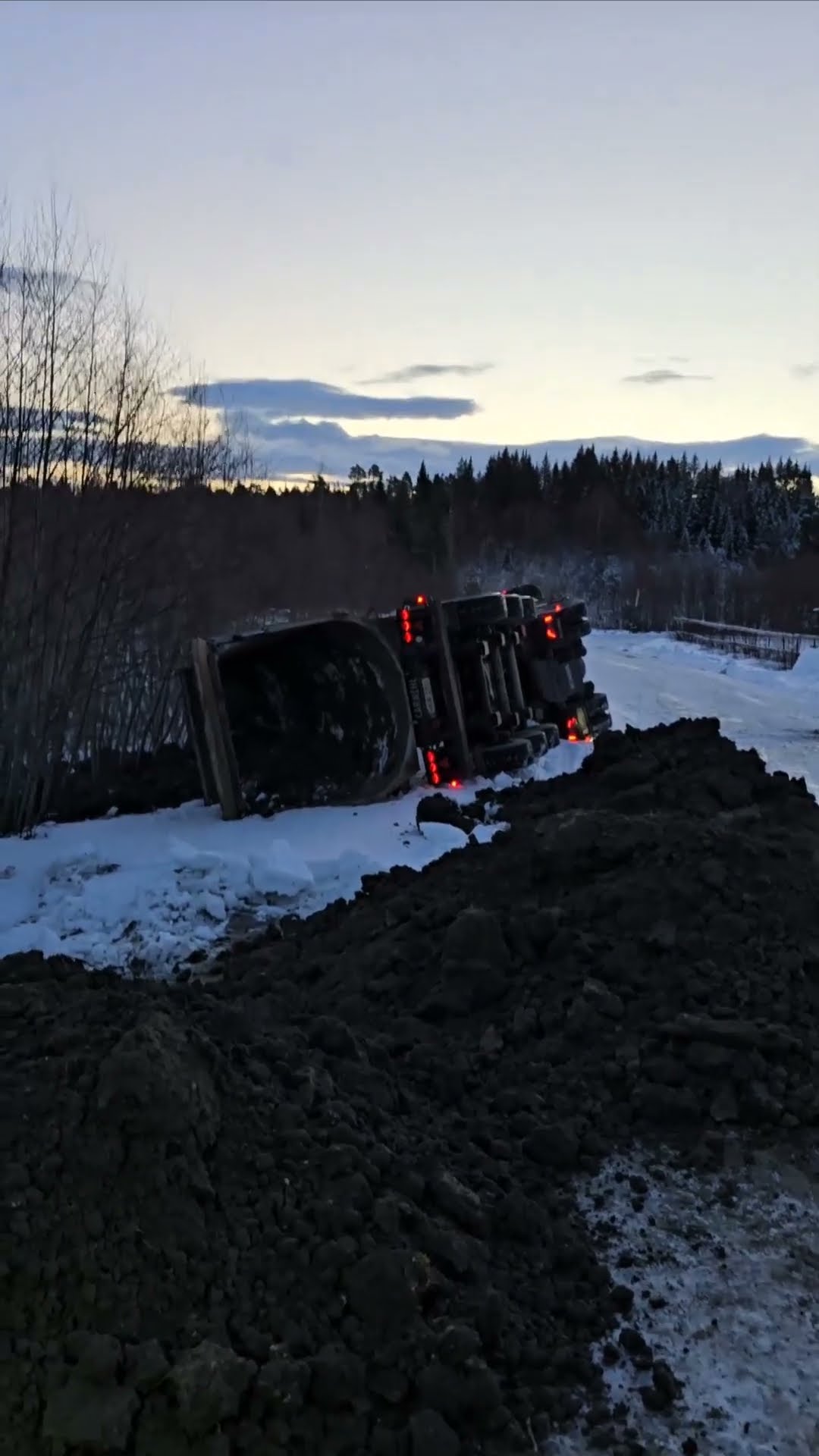 Truck Tips Over While Backing Up In Snow || ViralHog