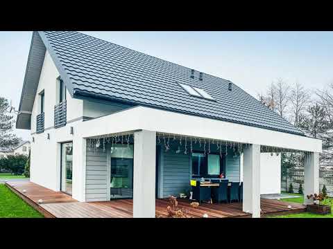 Video: Casă modernă cu fațadă din beton și lemn